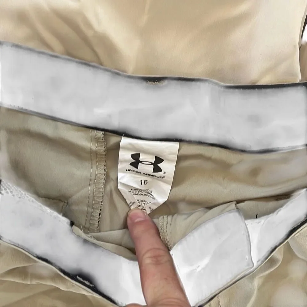 Bundle of boys shorts, new balance, and under Armour included sizes 14 to 16